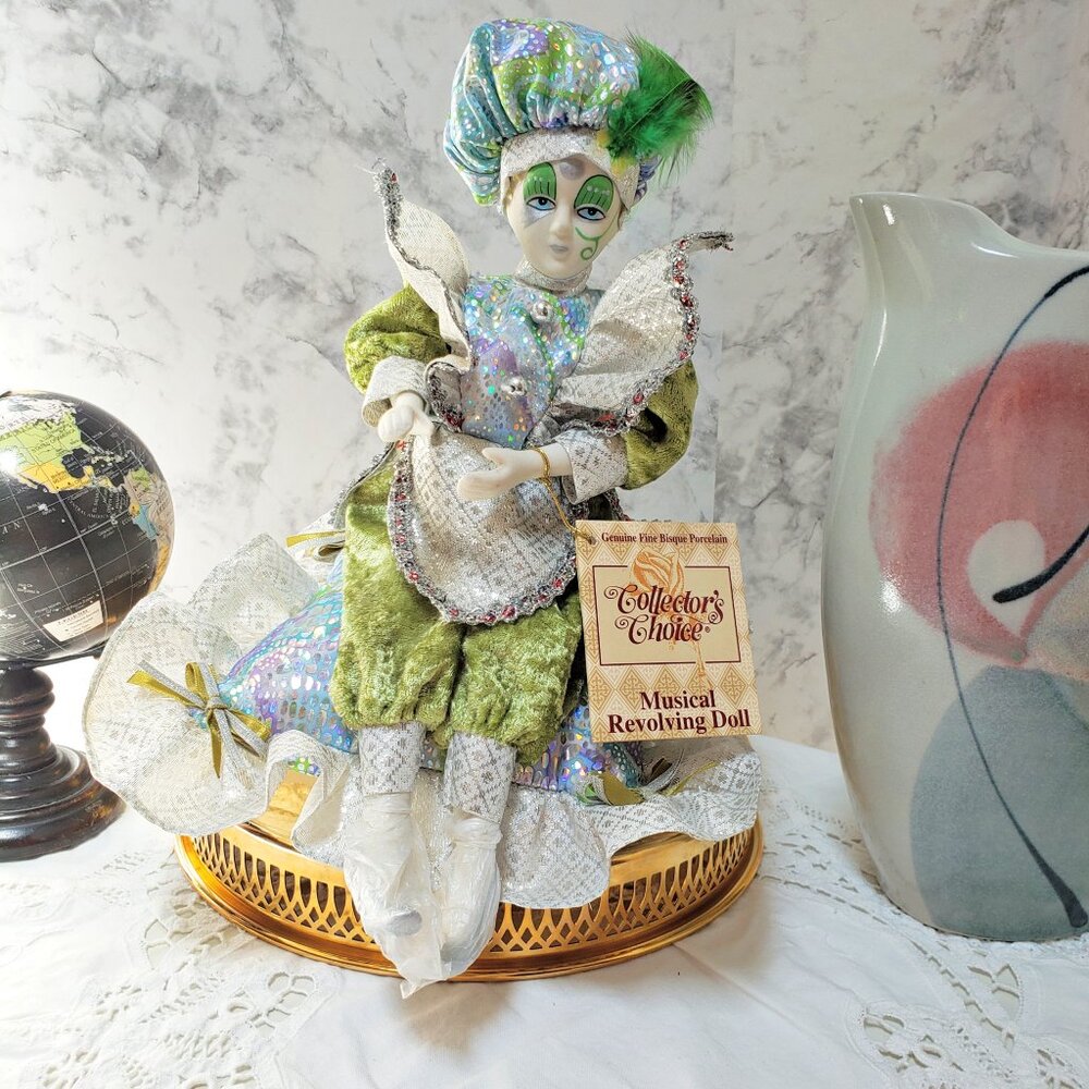 Vintage Harlequin Bisque Porcelain musical Doll on Ribbon Rffle Pillow in green